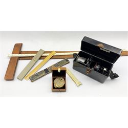 Astro Compass Mk II by Boes Co. Ohio, modern brass Stanley compass, two slide rules, T square etc  
