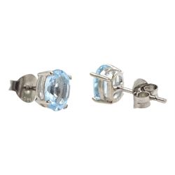  Pair of silver oval blue topaz stud earrings, stamped 925  