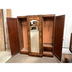Late Victorian veneered burr walnut breakfront triple wardrobe, the centre  mirrored door enclosing four slides and three drawers, flanked by two cupboards both fitted for hanging W178cm, H196cm, D62cm