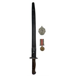 Wilkinson 1907 pattern bayonet dated 1917 with scabbard, Argyll and Sutherland Highlanders cap badge and George VI Special Constabulary Long Service medal to George Beaumont (3)