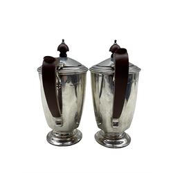 Silver small  coffee pot and matching hot milk jug of panel sided design with stained wood handles and lifts H17cm Birmingham 1935 19.6oz gross and in original Mappin and Webb box