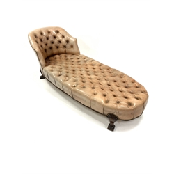 Georgian style chaise longue, with tub shaped raised back rest, upholstered in deep buttoned and studded leather, raised on lobe carved walnut supports, L200cm, H75cm, D80cm