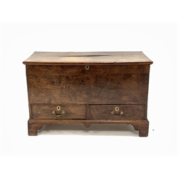 Late 19th century oak mule chest, the hinged lid over two drawers, raised on shaped bracket supports, W111cm