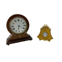 A late 19th  century French bedside table clock and a late 20th century English bedside strut clock.

