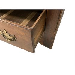 18th century oak mule chest, the hinged rectangular top opening to reveal candle box over two short drawers, the front with four arched fielded panels, fitted with two drawers to base, raised on stile supports with shaped spandrels, on castors