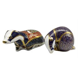Royal Crown Derby paperweights comprising 'Moonlight Badger' an exclusive for the Collectors Guild dated 2001, and another badger, 1994 (2)