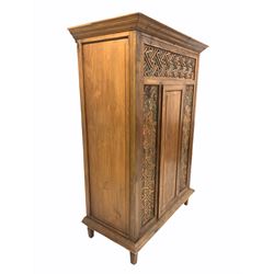 Indian painted hardwood hutch cupboard, with geometric and floral  blind fret work, two shelves to interior, raised on square tapered supports W135cm, H195cm, D69cm