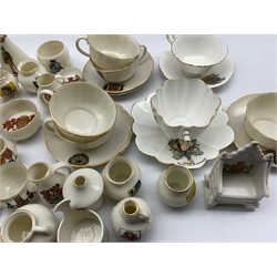 Collection of W.H. Goss and other crested ware including: Model of Queen Victoria's baby shoe, the exact size of the first shoes worn by Princess Victoria HM the late Queen, Model of Elizabethan Bushel Measure, three teacups and saucers, Carlton China bust and other examples 