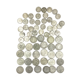 Approximately 570 grams of pre 1947 Great British silver half crowns, one dated 1930 and various one shilling coins