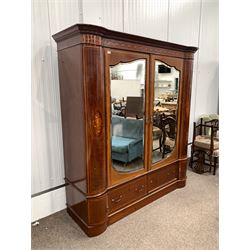 Large Edwardian inlaid mahogany double wardrobe, dentil cornice over two bevel glazed mirrored doors enclosing interior fitted for hanging, two drawers and two bow front cupboards to base W199cm, H215cm, D67cm