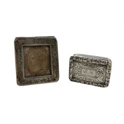 William IV silver vinaigrette with gilded hinged grille, engraved with initials Birmingham 1832 Maker Nathaniel Mills and a silver stamp box on ball feet Birmingham 1900 Maker Levi & Salaman (2)
