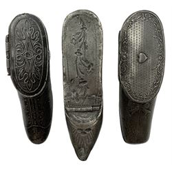 Three 19th century pewter snuff boxes in the form of shoes, two having engine turned decoration and the other with punches stitching details, L8.5cm max