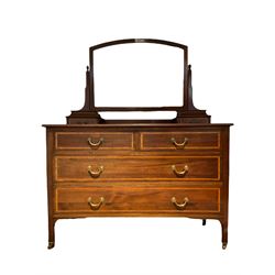 Edwardian inlaid mahogany dressing chest, raised bevelled swing mirror over two small trinket drawers, rectangular top with inlaid banding fitted with two short and two long drawers, raised on square supports with brass and ceramic castors 