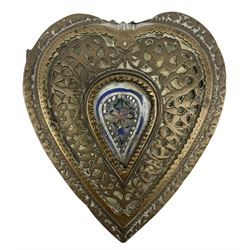 18th or 19th century Islamic/Persian brass heart-shaped travelling make-up box, the ornate pierced cover opening to reveal two compartments with hinged double container, 12cm x 10cm 