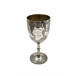 Victorian silver challenge cup with engraved decoration and presentation inscription 'Deighton Demonstration Pony Race 1898' H26cm Sheffield 1897  Maker Atkin Bros. 15.3oz