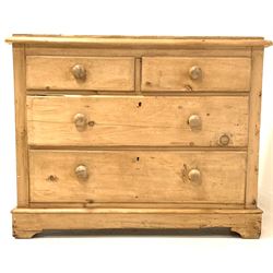 Victorian pine chest of two long and two short drawers, raised on shaped plinth base W106cm, H86cm, D50cm