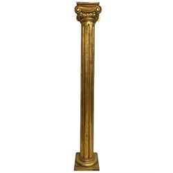 Classical carved giltwood Ionic column, square top over volute and egg and dart carved capital, fluted shaft on circular and square moulded base