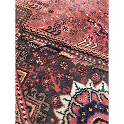 Persian Hamadan design red ground runner rug, triple medallion enclosed by border 330cm x 115cm