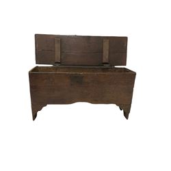 17th century six plank boarded chest or coffer, the hinged lid fitted with iron work, the front with shaped apron and brackets