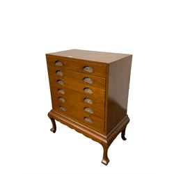 Oriental cutlery cabinet fitted with six drawers on shaped supports W61cm