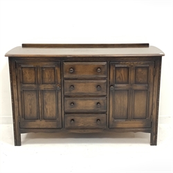 ercol oak dresser base fitted with four drawers and two cupboards, W147cm, H93cm, D51cm