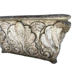 Mid-20th century cast stone garden planter, tapered rectangular form with rolled moulded edge, decorated with anthemion motifs and scrolled foliate 