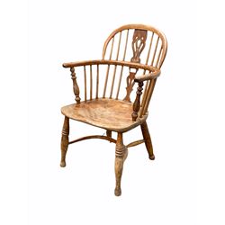 19th century elm and yew Windsor chair, double hoop spindle and splat back over saddle seat, raised on turned supports united by crinoline stretcher 
