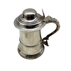 Early George III silver lidded tankard, the domed hinged cover with pierced scroll form thumbpiece and S scroll handle H20cm London 1770 Makers mark I*M possibly Jacob Marsh 28oz