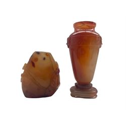19th century Chinese  carnelian vase carved with carp and masks on an oval foot H11cm  and a carnelian snuff bottle of tapering design carved with flowers H7cm