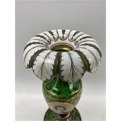 19th century Bohemian green glass table lustre with white overlay acanthus turn-over rim, the body painted with an oval head and shoulders portrait of a young woman on an extensive gilt foliate scroll work ground, H34cm lacking drops