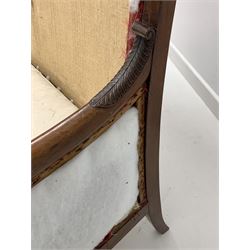 Regency mahogany three seat sofa, cresting rail carved with scrolls and gadroon moulding, the arm rests in the form of scaled mythical fish, two feather filled squab cushions, raised on square tapered and splayed supports, possibly French Empire W180cm, H98cm, D62cm