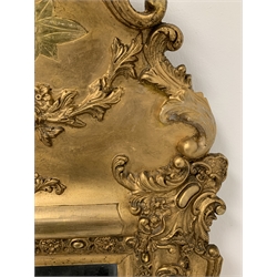  Late 19th century upright wall mirror with ornate leaf moulded gilt frame and two mirrored plates, 73cm x 166cm  