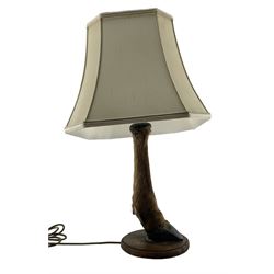 Pair of table lamps formed from deer slots mounted on oak shields, each with cream octagonal shade, H63cm