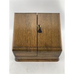 Edwardian oak slope front correspondence box with two hinged doors and fitted interior, W31cm x H26cm