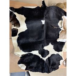 Hides / Skins: Three good quality hides comprising Kudu, impala and black and white cow max 164cm x 140cm