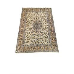 Fine hand knotted Persian Kashan carpet, floral medallion on grey field enclosed by border  244cm x 374cm