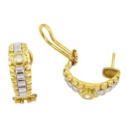 Pair of 18ct white and yellow gold round brilliant cut diamond half hoop earrings, stamped 750, with receipt dated 1991