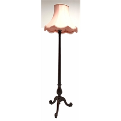  Quality mahogany 1920's standard lamp, with leaf carved and fluted column raised on triple spay supports, with tasseled shade, H191cm   