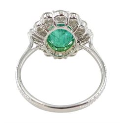 18ct white gold emerald and diamond cluster ring, the central oval emerald with baguette, tapered baguette and round brilliant cut diamonds, stamped 750, emerald 2.46 carat, with World Gemological Institute Report