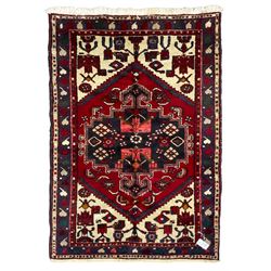 Persian Hamadan rug, central stepped pole medallion, decorated with stylised flower heads