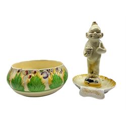 Clarice Cliff Newport Pottery relief moulded fruit bowl together with a Wilkinson novelty ashtray and match striker, 'The Chairman' H28cm 