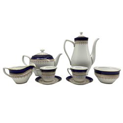 Comprehensive Royal Worcester Regency cobalt blue dinner service for twelve comprising teapot, twelve cups & saucers, milk jug, sugar bowl, coffee pot, twelve coffee cups & saucers, twelve tea plates, twelve side plates, eighteen dinner plates, twelve soup bowls, two serving dishes, pair of tureens, pair of graduated oval platters, pair of sauceboats and stands and two dishes