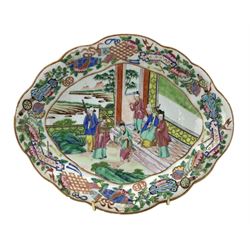 19th century Chinese Canton Famille Rose dish, of lobed lozenge form, decorated with figures on a terrace, the border with precious objects, flowers and leafage, L27.5cm x W22.5cm 