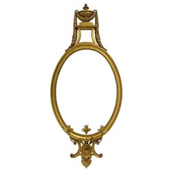 Pair of late 20th century Neoclassical design giltwood girandole wall mirrors, the pediment decorated with urn interlaced with laurel leaf festoon, small waisted mirror plate over oval mirror plate within a moulded frame with beaded slip, three branch candelabra supported by C-scrolled lower bracket decorated with leaf

Designed for the late Dowager Lady St Oswald by Francis Johnson (Yorkshire 1911-1995) circa. 1990s and made by Dick Reid (Newcastle upon Tyne 1934-2021). 

Together with various proposed designs and working drawings by Johnson. 

Provenance: From the Estate of the late Dowager Lady St Oswald