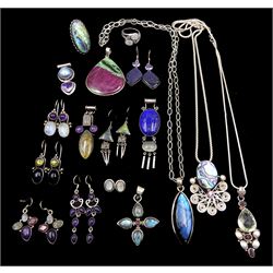 Collection of silver jewellery including a ring, necklaces, earrings and pendants set with moonstone, amethyst, abalone and labradorite etc  