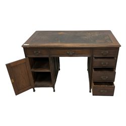 Late Victorian mahogany kneehole desk, rectangular top with canted corners and moulded edge with inset writing surface, fitted with five graduating drawers and single cupboard