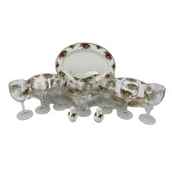  Royal Albert Old Country Roses dinner service comprising eight dinner plates, eight dessert plates, eight soup bowls, gravy boat and stand, oval meat plate and pair of condiments together with seven Old Country Roses wine glasses (36)