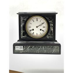 19th century black slate and variegated marble mantel clock. white enamel dial with Roman chapter ring, eight day movement striking hammer on bell 