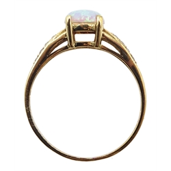 9ct gold opal ring, with cubic zironia shoulders,  hallmarked