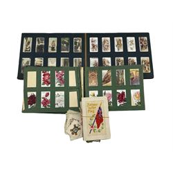 Selection of Cigarette Cards & Regimental Crests/Badges including, Turf Cigarettes - Horses and Hounds (1920s) - Cavenders Cigarettes - Camera Studies (1926) - Cavenders Cigarettes - The Homeland Series (1924) - Players Cigarettes - Dogs (1924) - Players Cigarettes - Racing Caricatures (1925) - De Reszke Cigarettes - Real Photographs (1928) - Wills's Cigarettes - Roses (1912) - Players Cigarettes - Wonders of the World Silk Regimental Crests and Badges (1914/18) WW1 Silk Embroidered Postcard - Honour to the Flag Selection of early 20th Century Postcards and Greetings Cards